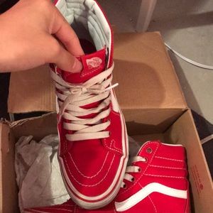 Red and white high top vans